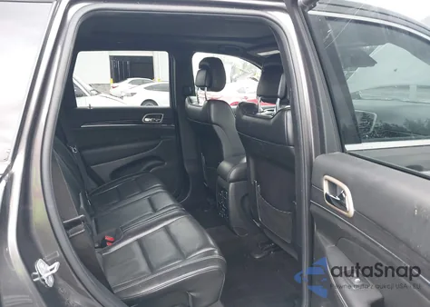 2014 Jeep Grand Cherokee Overland z USA, uszkodzony, nr VIN 1C4RJFCMXEC417525